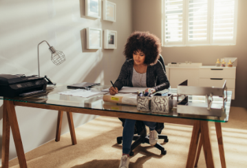 Woman working in a home office.