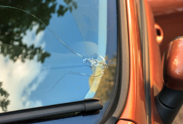 What should you do if your windshield is cracked or chipped?